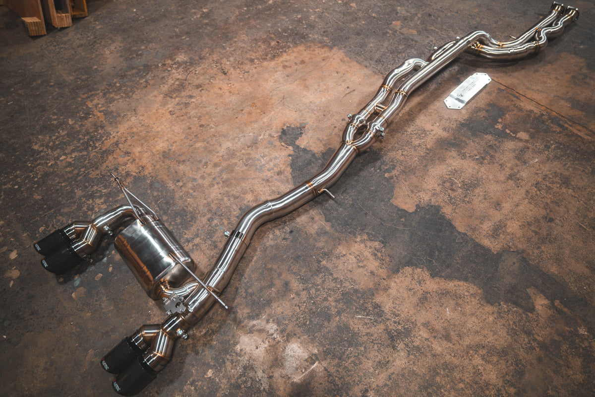 Valvetronic Designs equal-length exhaust for BMW F8x M3 M4, rear fitment view